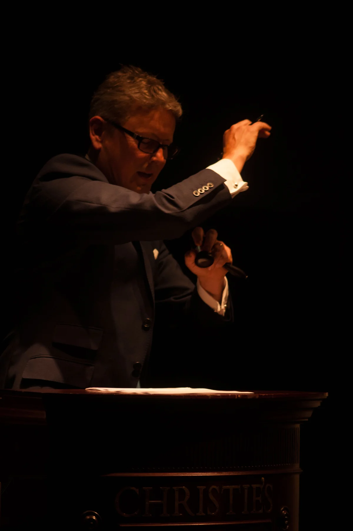 Jussi Pylkkänen, the global president of the auction house Christie's, directs a sale. 2014