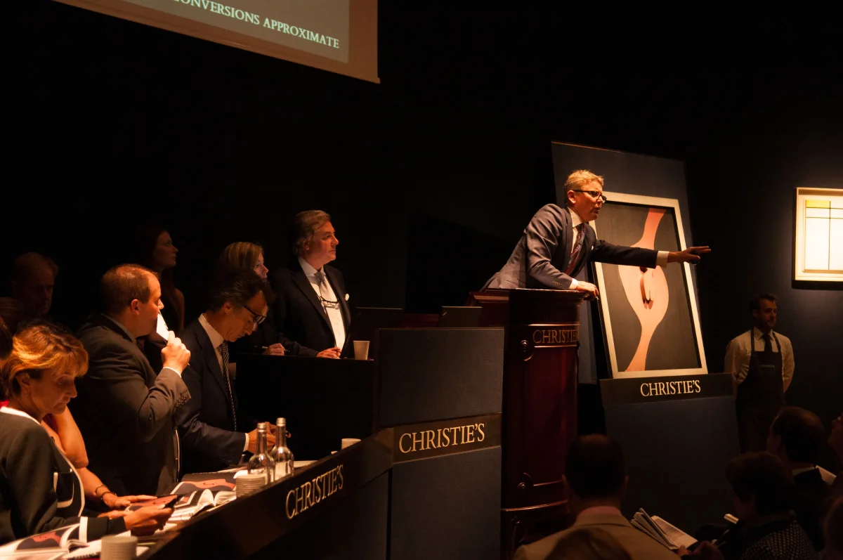 Jussi Pylkkänen, the global president of the auction house Christie's, directs a sale. 2014
