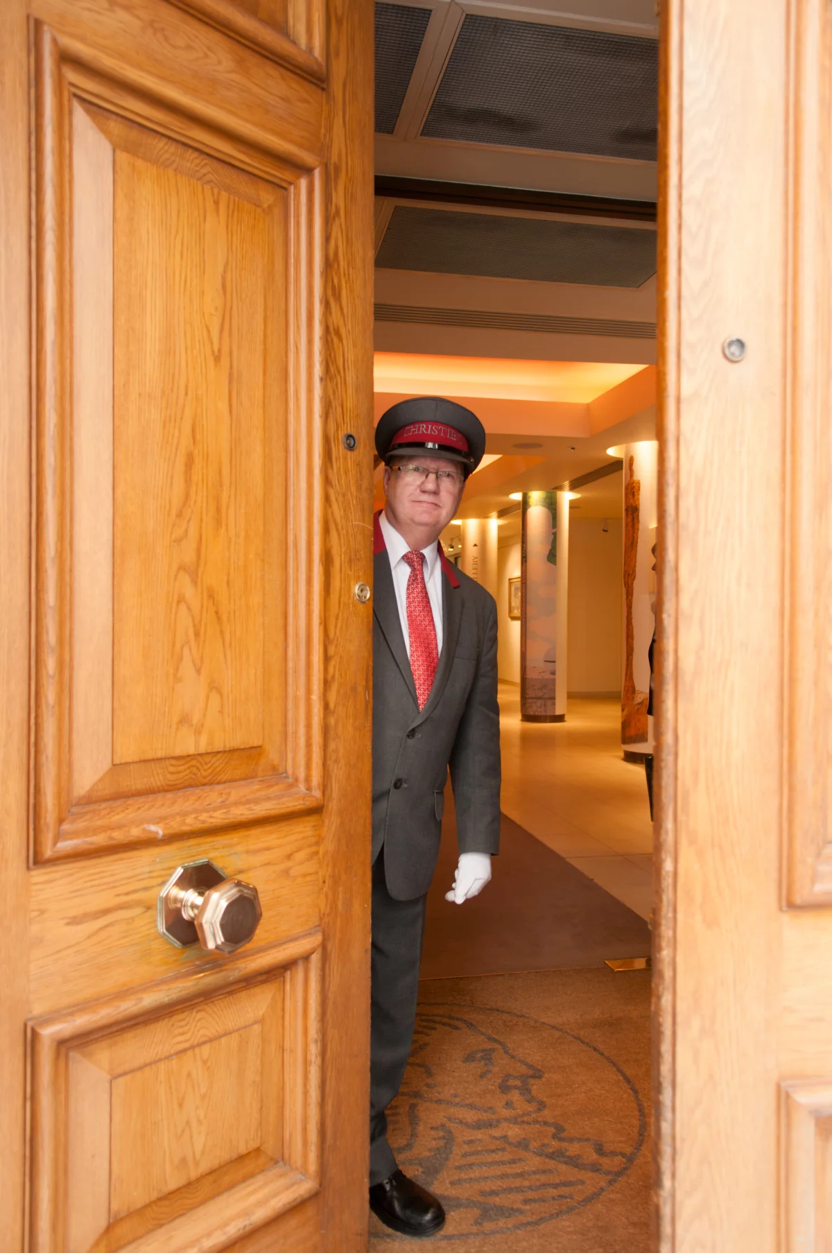 Colin, Christie's - an auction house in London - doorman. 2014