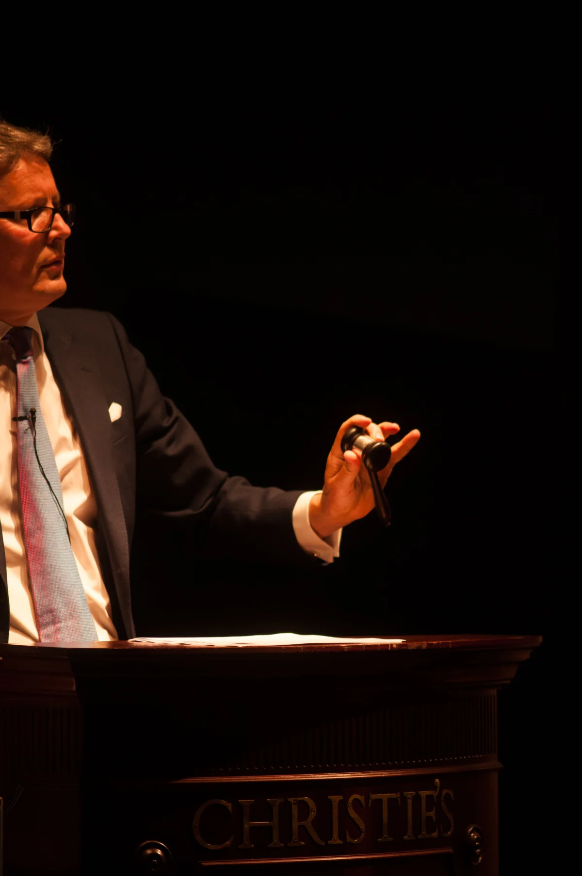 Jussi Pylkkänen, the global president of the auction house Christie's, directs a sale. 2014